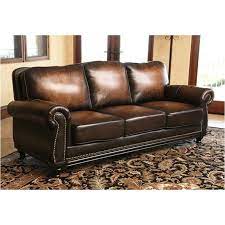 abbyson soro leather sofa in hand