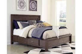 Shop beds from ashley furniture homestore. Dellbeck Queen Panel Bed With 4 Storage Drawers Ashley Furniture Homestore