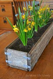 This one was made out of old pallet wood, so it was very thrifty too. Diy Rustic Wood Planter Box Diy Wood Planter Box Diy Wood Planters Diy Planter Box