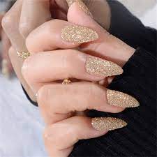 sparkly gold glitter false nail almond