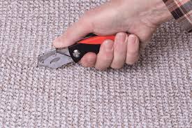 how to use a carpet cutter or trimmer