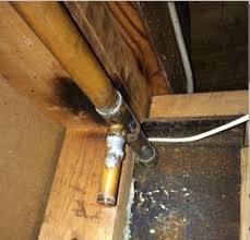 repair leaky copper pipe in basement