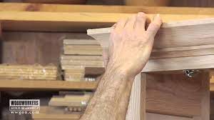 installing crown molding on a cabinet