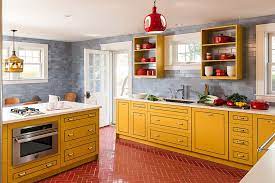 Red and yellow makes for a very energetic duo, as is the case with the goldenrod yellow and cherrywood red in this lively kitchen. 30 Beautiful Yellow Kitchen Ideas