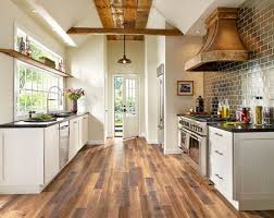 Learn the pros and cons of laminate flooring, hardwood and tile, plus tips for installing all kitchen flooring. Pros And Cons Of 5 Popular Kitchen Flooring Materials