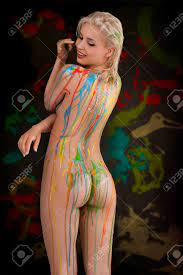 Beautiful Blond Nude Girl With Multicolored Body Paint Over Her Body  Smiling With Sexy Pose Against Gray Background. Stock Photo, Picture and  Royalty Free Image. Image 27022893.