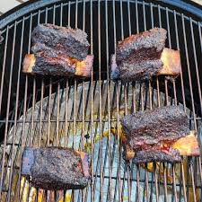 smoked beef short ribs open fire