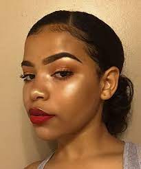 red lipstick and highlight makeup look