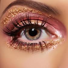 pink eye makeup and a gold eye makeup