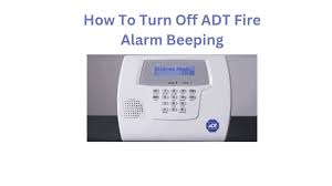 how to turn off adt fire alarm beeping