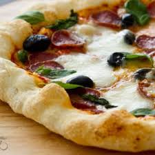 homemade pizza in the oven with