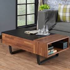 Our coffee table ottomans are upholstered in an array of resilient fabrics such as faux leather and linen look blends. Lipscomb Solid Coffee Table With Storage Coffee Table Solid Coffee Table Stylish Coffee Table