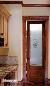 stained pantry door with frosted glass