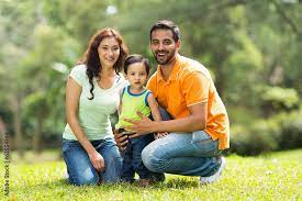 happy indian family outdoors stock