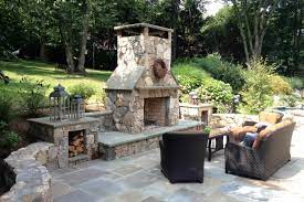 25 warm and cozy outdoor fireplace designs