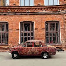 lada wrapped in persian rugs