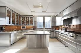 The drawers and cabinets can be used as a pantry or to store silverware, dishes, pots, pans, and more. Billionaire Walmart Heiress Drops 25m On Park Ave Condo Industrial Kitchen Design Steel Kitchen Cabinets Modern Kitchen