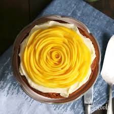 With a wooden spoon, slowly begin mixing the wet ingredients into the dry ingredients until the mixture is combined. Mango Sour Cream Kuchen What Bakes Me Smile