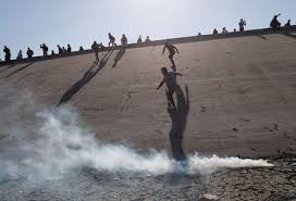 Image result for tear gas in tijuana border