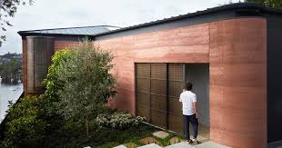Rammed Earth Walls Surround This House