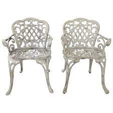 Pair Of Early Cast Iron Garden Chairs