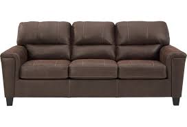 Shop ashley furniture homestore online for great prices, stylish furnishings and home decor. Ashley Signature Design Navi 9400338 Faux Leather Sofa Dunk Bright Furniture Sofas