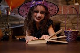 witch makeup and book for halloween