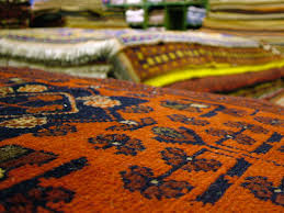 loose yarns on your area rug