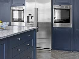 The midnight blue shaker starter kitchen contains: How To Paint Kitchen Cabinets In 9 Steps This Old House