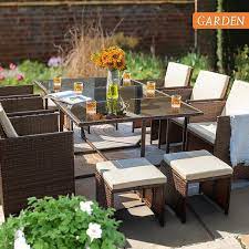 Tozey Brown 11 Piece Rattan Wicker Outdoor Dining Set With Washed Beige Cushion And Glass Table