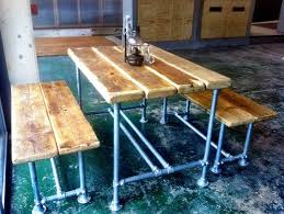 large reclaimed scaffold dining table