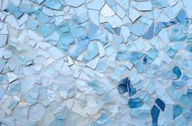 A Blue Mosaic Of Broken Glass Is Shown