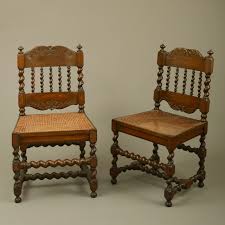 a pair of cape dutch stinkwood chairs
