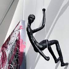 Uploaded at may 28, 2019. Climbing Man Wall Sculpture For Sale Black Or Gold Resin Or Brass