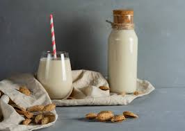 premium photo almond milk in a glass