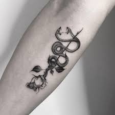 Snake tattoo on back shoulder. Tribal Tattoos X Small Snake Tattoo On Finger