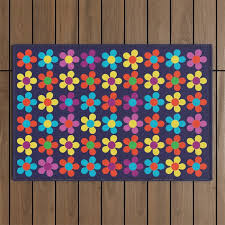 colored daisies outdoor rug