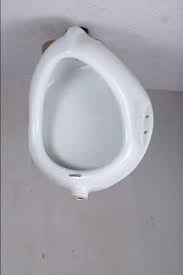 white ceramic flat back urinal