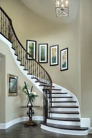 Curved Staircase Foyer Decorating