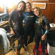 Shop online or in one of our 5 megastores. Three Wetsuit Cuties