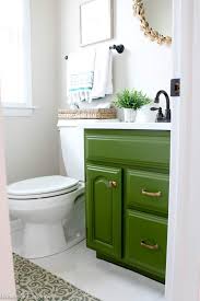 Small, floating, with drawers, timber, modern, vintage, rustic, white, hamptons style. Pretty Powder Room Makeover Olive Green Bathroom Vanity