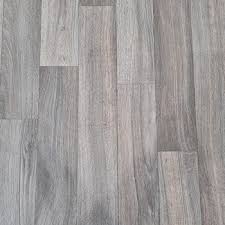 Luxury vinyl tiles replicate the natural beauty of wood stone slate and marble and are designed for use in residential and commercial interiors. Vinyl Flooring J W Carpets