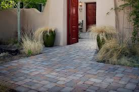 Whether you plan to install brick, concrete or stone pavers the following paver installation steps should be of help. Walkway And Patio Installation Using Concrete Pavers On A Slope Bayside Pavers