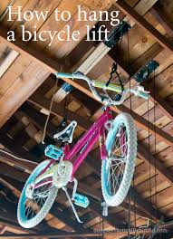 Wennow new bicycle bike lift ceiling mounted hoist storage garage hanger durable rack. How To Hang A Bicycle Lift Simple Practical Beautiful