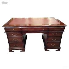Antique desks, including roll top desks, writing desks, and secretary desks, all possess the sort of doors, pockets, and pigeon holes required to keep clutter at bay. Antique Writing Desks Antique Reproduction Shop