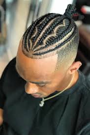 This hairstyle is perfect for men who have shaved hair on the sides and long hair on the top. Manbraid Alert An Easy Guide To Braids For Men