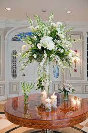 white wedding reception flowers tall
