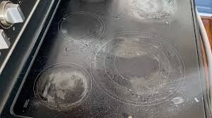 to clean a flat black glass stove top