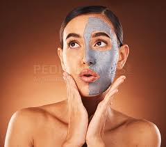 woman clay face mask and beauty