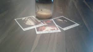 candle wax and polaroids on the hard